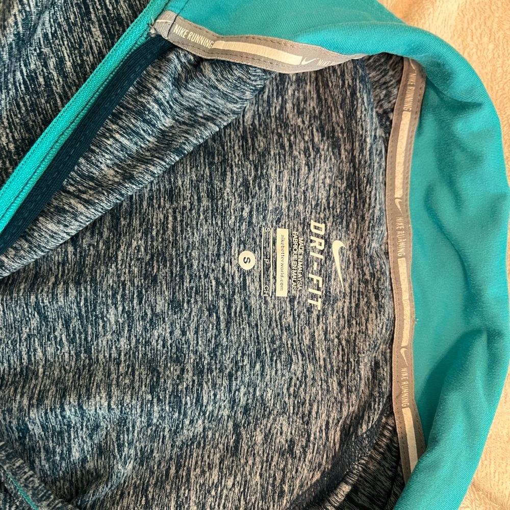 Nike running shirt. Super soft and comfortable.